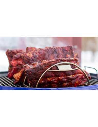 Supporto di cottura per costine Weber con costicine di maiale Supporto di cottura per costine Weber con costicine di maiale